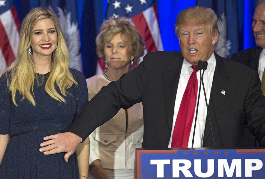 Republican presidential candidate Donald Trump pats his expecting daughter Ivanka Trump while celebrating victory in the South Carolina primary in Spartanburg, South Carolina, February 20, 2016. Republican presidential frontrunner Donald Trump grabbed a big win in the South Carolina primary, capturing about a third of the votes, according to early counts, but all major networks projected Trrump the winner. / AFP / JIM WATSON (Photo credit should read JIM WATSON/AFP/Getty Images)